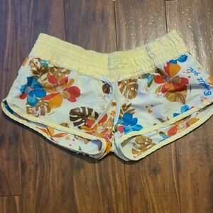 Split Yellow and Orange Athletic Shorts Vibrant Design